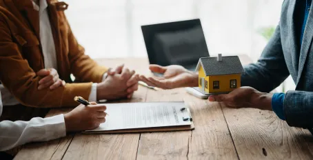 Slider image of tenant features with a cozy apartment living room